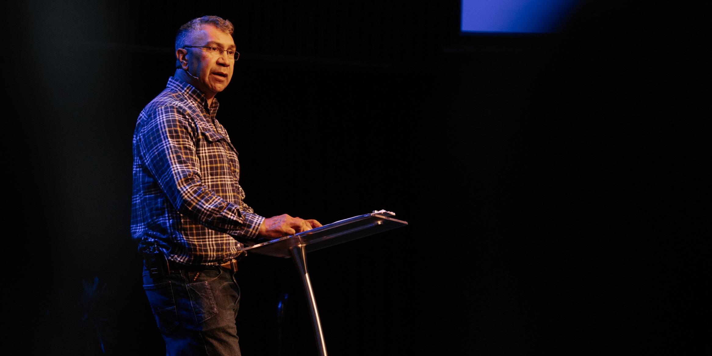 Paul Girrawah speaking at a lectern